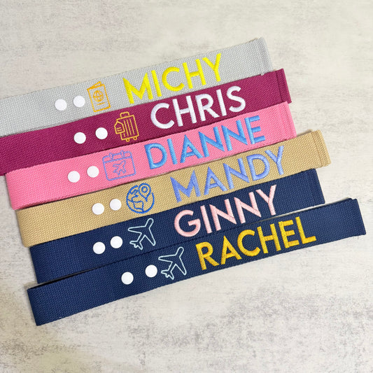Set of personalized name straps with different designs and colors on a light gray background.