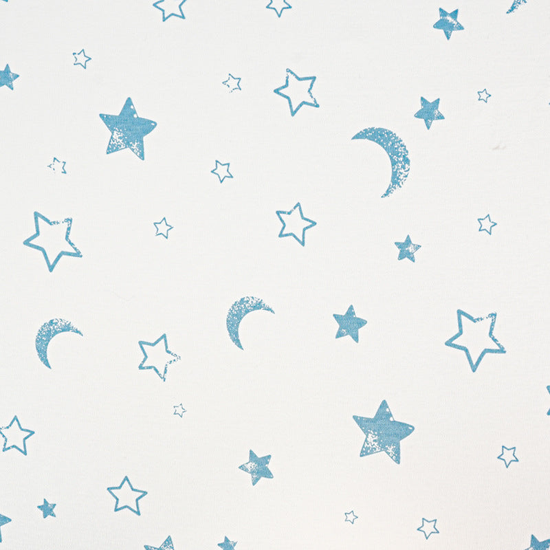 Pattern of blue stars and moons on a white background