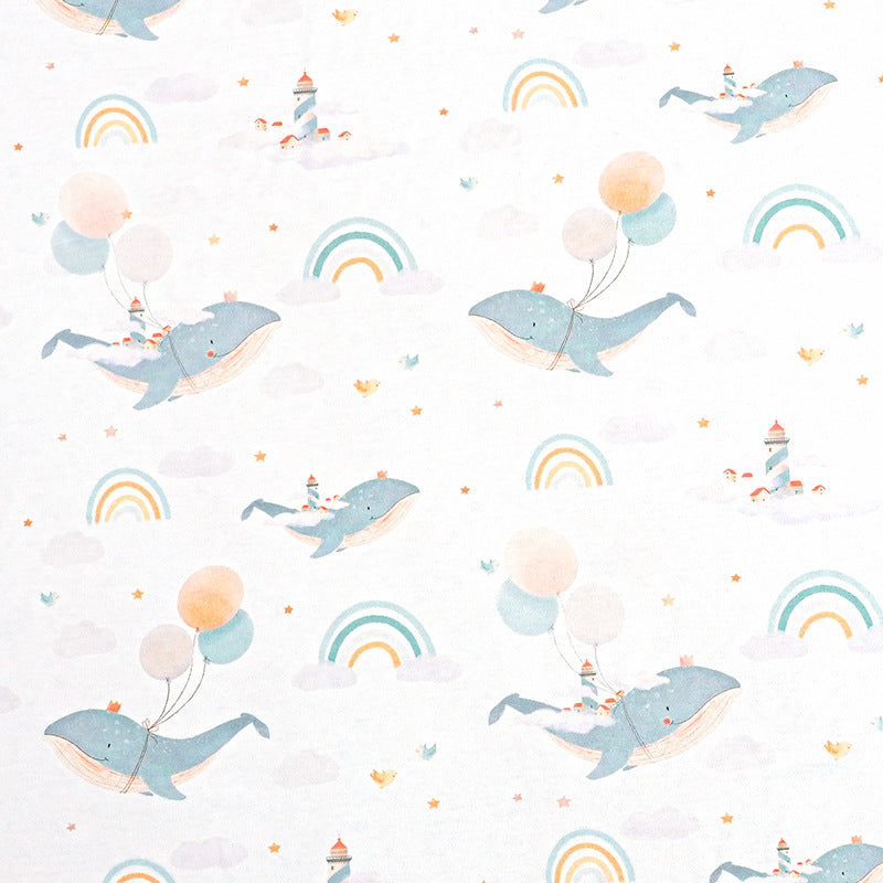 Pattern of blue whales with balloons and rainbows on a light background